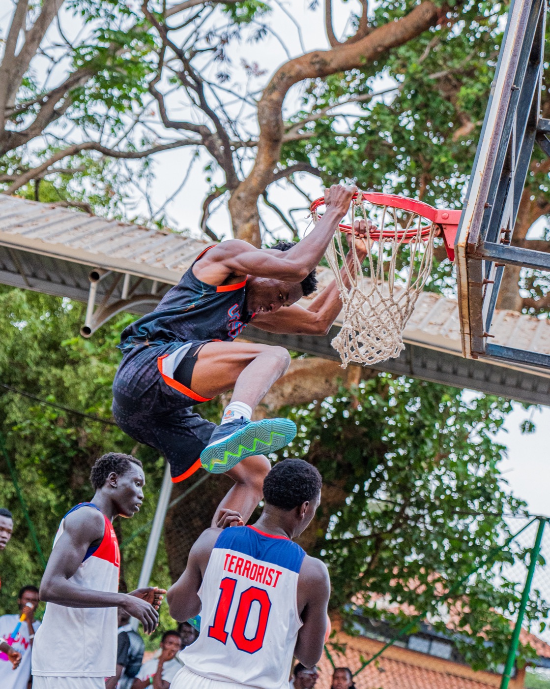 Umoja player attacking the basket