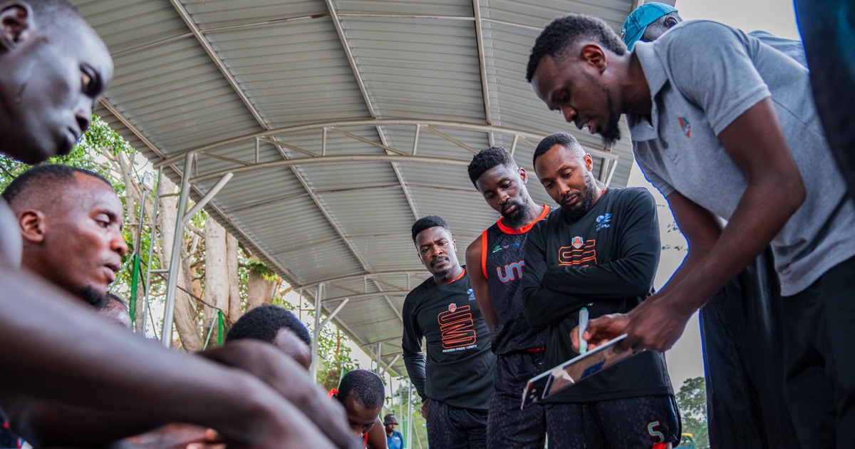 Umoja Basketball huddle during a team talk